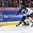 MONTREAL, CANADA - DECEMBER 29: Finand's Kristian Vesalainen #34 grabs hold of Sweden's Oliver Kylington #7 as he plays the puck during preliminary round action at the 2017 IIHF World Junior Championship. (Photo by Francois Laplante/HHOF-IIHF Images)

